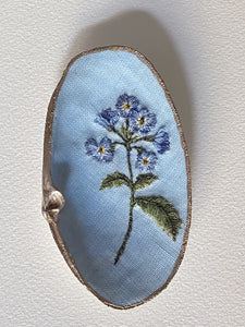 Coquillages brodés